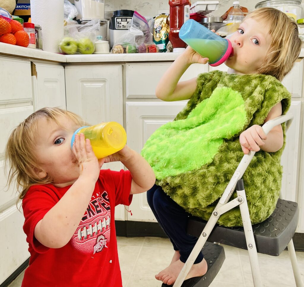 Two of the author's children are pictured. Parenting and caregiving require writers to set realistic goals. Write one page,. If you're writing a page a day, don't punish yourself for not writing more.